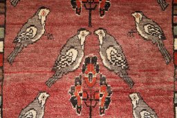 Full view of 2000s Shiraz rug from Iran / Persia, 195 × 108 cm in Red tones