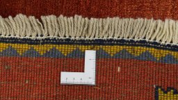 Full view of 1990s Shiraz rug from Iran / Persia, 145 × 83 cm in Red tones
