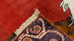 Close-up detail of 1990s Shiraz rug from Iran / Persia showing Wool weave