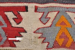 Close-up detail of 1950s Sirjan rug from Iran / Persia showing Wool weave