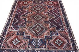 Surface texture of 1970s Sirjan rug with natural Wool and intricate pattern