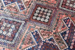 Close-up detail of 1970s Sirjan rug from Iran / Persia showing Wool weave