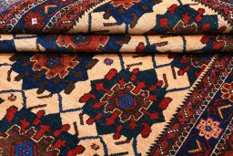 Corner detail of 1970s Sirjan rug showing border pattern and Wool pile