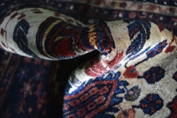 Close-up detail of 2000s Sirjan rug from Iran / Persia showing Wool weave