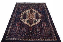 Surface texture of 2000s Sirjan rug with natural Wool and intricate pattern