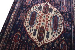 Backside of handmade 2000s Sirjan rug showing knot structure and weave density