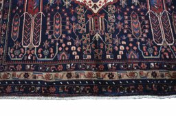 Close-up detail of 2000s Sirjan rug from Iran / Persia showing Wool weave