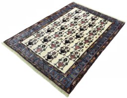Corner detail of New Sirjan rug showing border pattern and Wool pile