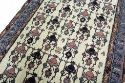 Backside of handmade New Sirjan rug showing knot structure and weave density