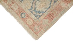 Backside of handmade New Sultanabad rug showing knot structure and weave density
