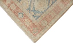 Backside of handmade New Sultanabad rug showing knot structure and weave density