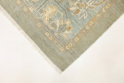 Backside of handmade New Sultanabad rug showing knot structure and weave density
