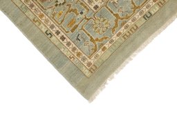 Backside of handmade New Sultanabad rug showing knot structure and weave density