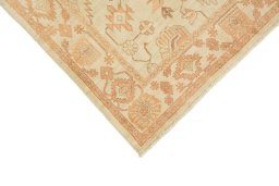 Backside of handmade New Sultanabad rug showing knot structure and weave density