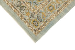 Backside of handmade New Sultanabad rug showing knot structure and weave density
