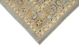 Backside of handmade New Sultanabad rug showing knot structure and weave density