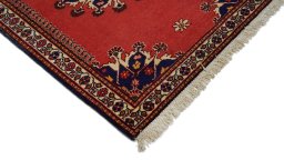 Surface texture of 1950s Tafresh rug with natural Wool and intricate pattern