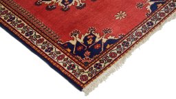 Surface texture of 1950s Tafresh rug with natural Wool and intricate pattern