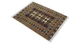 Corner detail of 1960s Torkaman rug showing border pattern and Wool pile