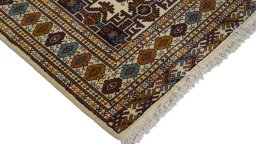 Surface texture of 1960s Torkaman rug with natural Wool and intricate pattern