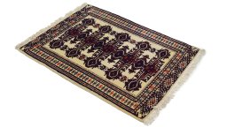 Corner detail of 1960s Torkaman rug showing border pattern and Wool pile