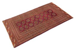 Corner detail of 1960s Torkaman rug showing border pattern and Wool pile