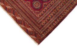 Backside of handmade 1960s Torkaman rug showing knot structure and weave density