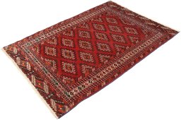 Corner detail of 1960s Torkaman rug showing border pattern and Wool pile