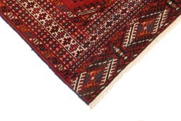 Backside of handmade 1960s Torkaman rug showing knot structure and weave density