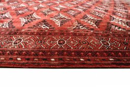 Corner detail of 2000s Torkaman rug showing border pattern and Wool pile