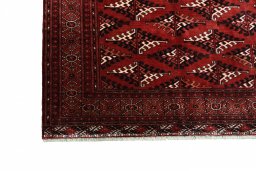 Close-up detail of 2000s Torkaman rug from Iran / Persia showing Wool weave