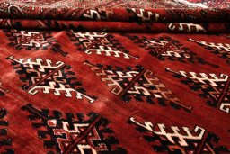 Backside of handmade 2000s Torkaman rug showing knot structure and weave density