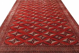 Surface texture of 2000s Torkaman rug with natural Wool and intricate pattern