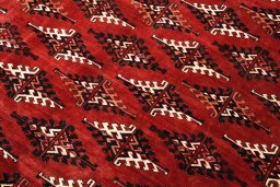 Close-up detail of 2000s Torkaman rug from Iran / Persia showing Wool weave