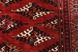 Full view of 2000s Torkaman rug from Iran / Persia, 301 × 233 cm in Red tones