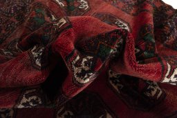 Corner detail of 2000s Torkaman rug showing border pattern and Wool pile