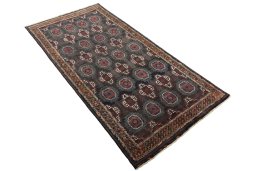 Close-up detail of 2000s Torkaman rug from Iran / Persia showing Wool weave