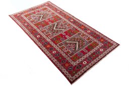 Close-up detail of 2000s Torkaman rug from Iran / Persia showing Wool weave