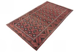 Corner detail of 2000s Torkaman rug showing border pattern and Wool pile