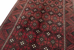 Backside of handmade 2000s Torkaman rug showing knot structure and weave density
