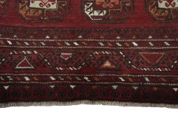 Backside of handmade 2000s Torkaman rug showing knot structure and weave density