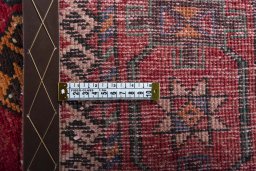 Corner detail of 1970s Torkaman rug showing border pattern and Wool pile