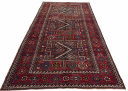 Surface texture of 1970s Torkaman rug with natural Wool and intricate pattern