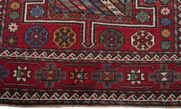 Backside of handmade 1970s Torkaman rug showing knot structure and weave density