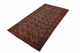 Corner detail of 2000s Torkaman rug showing border pattern and Wool pile