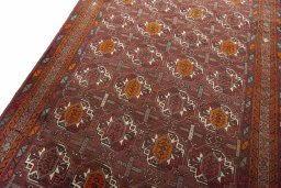 Backside of handmade 2000s Torkaman rug showing knot structure and weave density