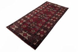 Corner detail of 2000s Torkaman rug showing border pattern and Wool pile