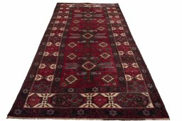 Surface texture of 2000s Torkaman rug with natural Wool and intricate pattern