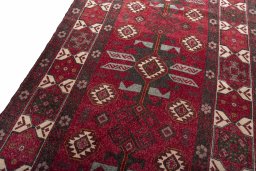 Backside of handmade 2000s Torkaman rug showing knot structure and weave density