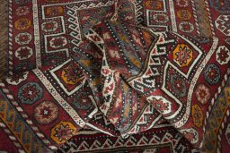 Corner detail of 2000s Torkaman rug showing border pattern and Wool pile